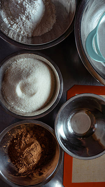 Baking ingredients in bowls for homemade dessert preparation