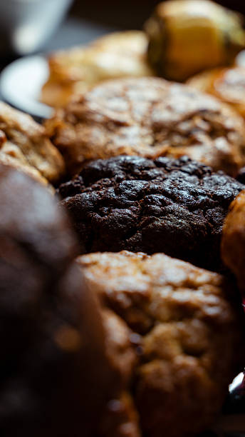 Assortment of fresh baked chocolate chip and banana muffins