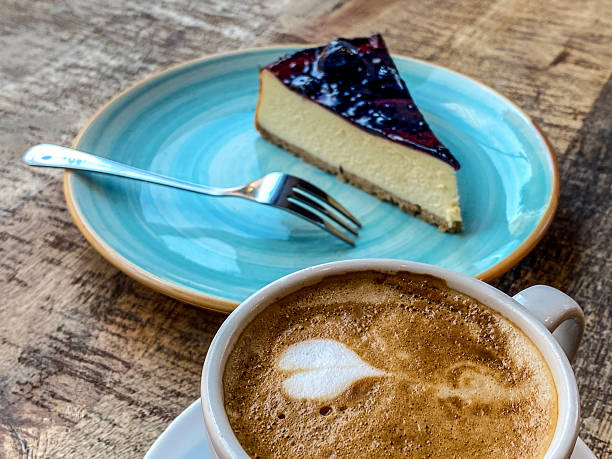 Blueberry cheesecake and cappuccino