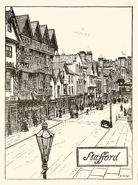 Historic street scene in Stafford, Staffordshire, featuring prominent Tudor-style half-timbered buildings. The scene includes figures in period clothing walking along the street and a classic gas lamp in the foreground.
