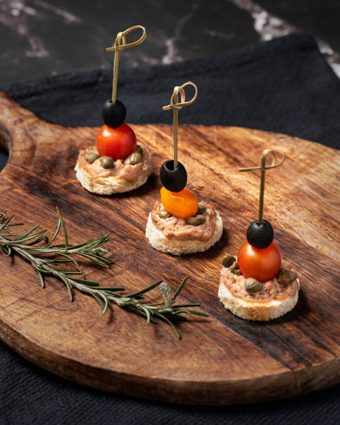A different types of canapes on a  serving tray