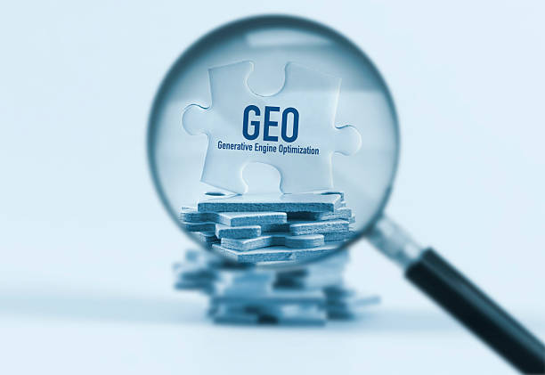 GEO Generative Engine Optimization A jigsaw puzzle piece with the text "GEO Generative Engine Optimization" being examined through a magnifying glass. Concept for AI-driven search trends, modern SEO strategy, and artificial intelligence marketing. SEO stock pictures, royalty-free photos & images