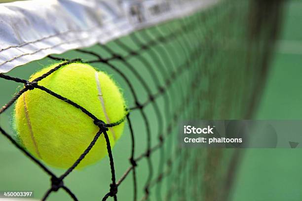 Tennis Ball In Net Stock Photo - Download Image Now - Activity, Competition, Equipment