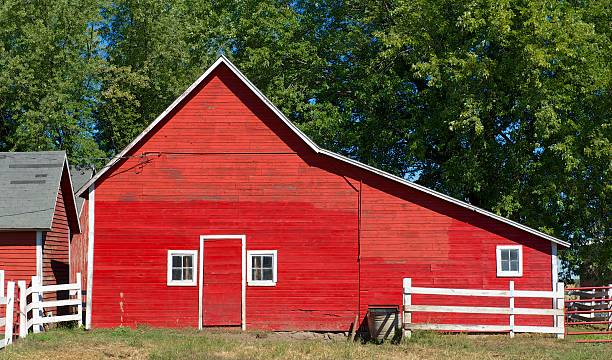 istock Red Wisconsin Barn With Door and Three Windows 450008655