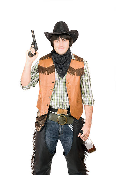 istock Portrait of cowboy with a gun 450014695