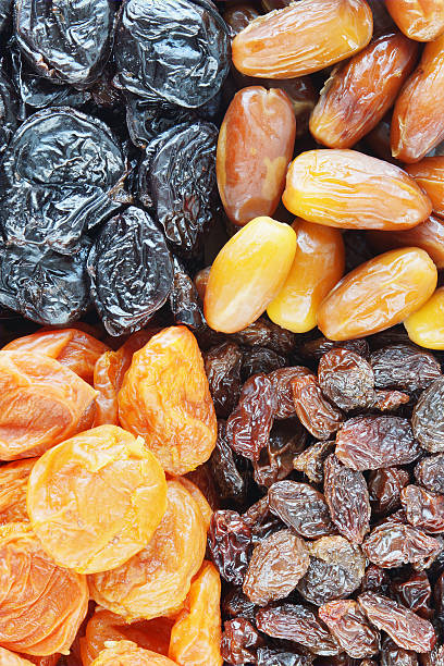 istock Background made of different dried fruits 450014983
