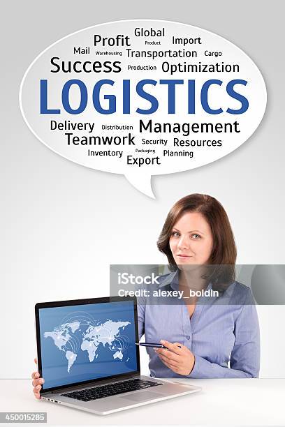 Logistics Manager Is Showing World Map On Laptop Screen Stock Photo - Download Image Now