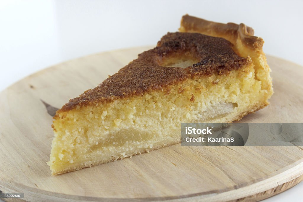 Bourdaloue pie Traditional french Bourdaloue pie: a pie with almond marzipan cream and pears. Almond Stock Photo