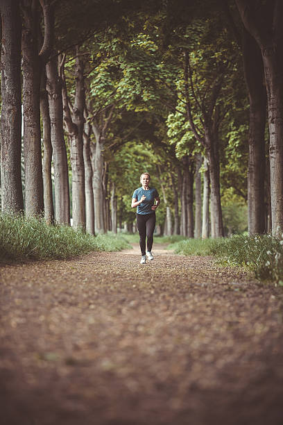 istock Marathon run in the autumn forest 450028953