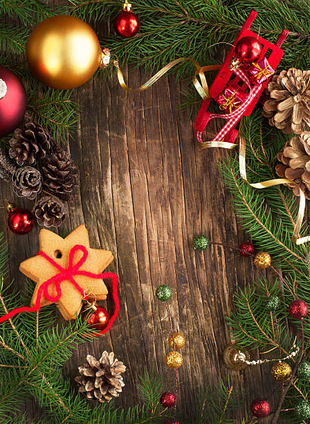 istock Frame with Christmas tree branches, cookies and ornaments 450029179