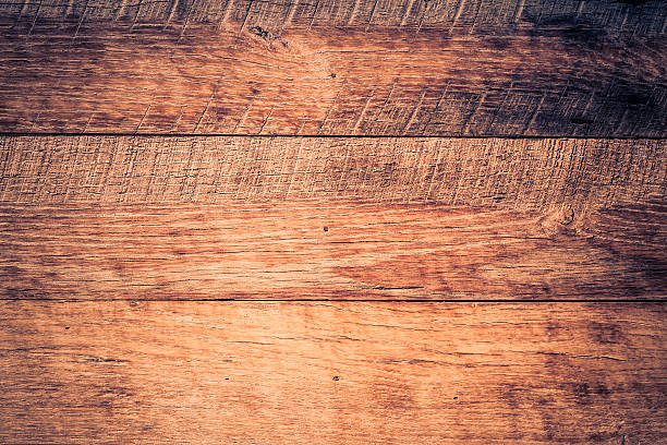 istock Old scratched wooden board 450030427