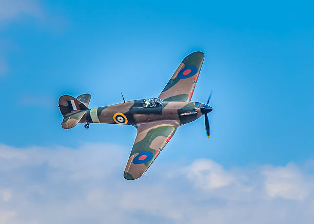 Cleethorpes, England - July 28, 2013: Hawker Hurricane airplane Cleethorpes, England - July 28, 2013: Hawker Hurricane WW2 airplane flying at the cleethropes air show fighter plane vintage stock pictures, royalty-free photos & images