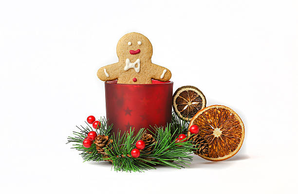 istock Gingerbread man sitting in New Year's candle 450032007