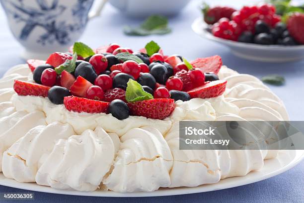 Cake Pavlova With Cream And Berries Stock Photo - Download Image Now - Afternoon Tea, Baked, Berry Fruit