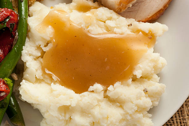 istock Homemade Organic Mashed Potatoes with Gravy 450039259