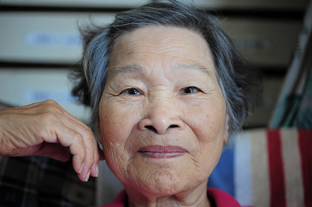 istock Senior Asian Woman 450040169