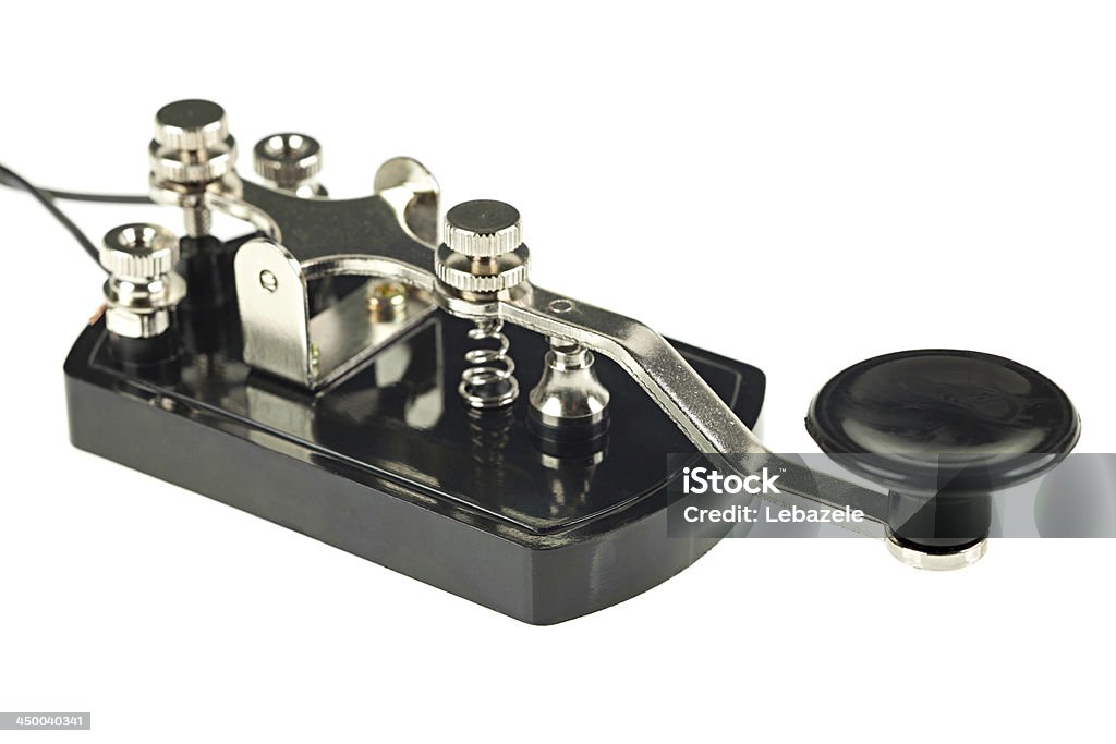 Telegraph Morse Key Telegraph (morse) key, isolated on white. Telegraph Machine Stock Photo