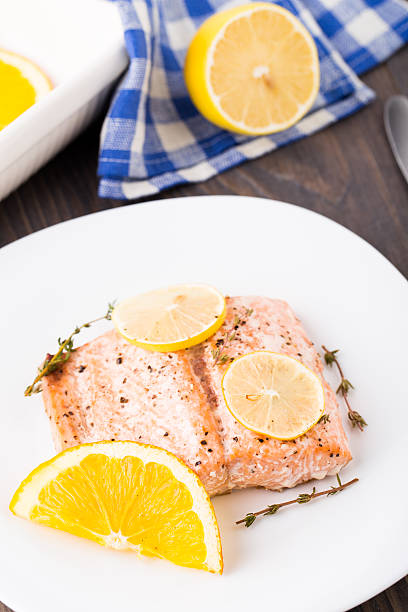 istock Salmon fillet with citrus and thyme 450055887