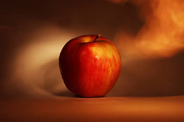 This is the photo of an apple made with the technique of light painting