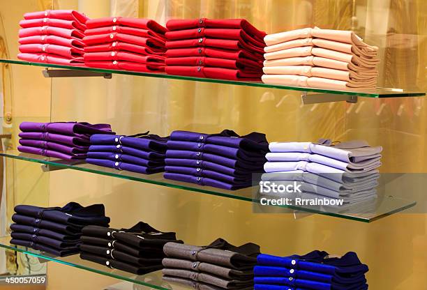 Folded Clothes In The Department Store Stock Photo - Download Image Now - Blue, Boutique, Bright