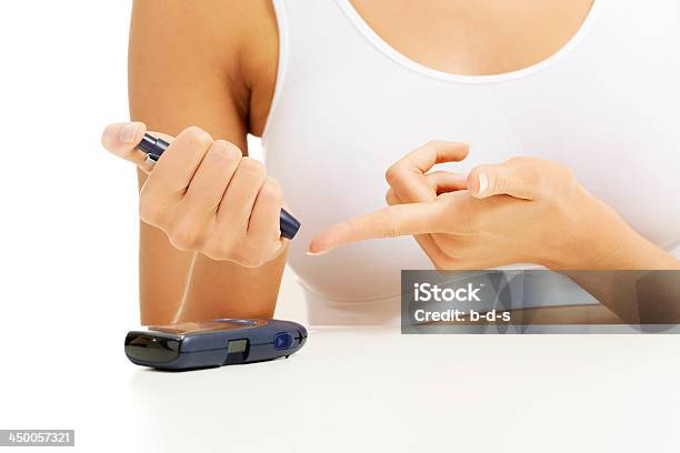 Diabetes Patient Measuring Glucose Level Blood Test With Glucometer Stock Photo - Download Image Now