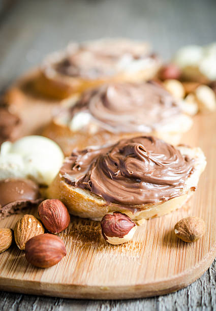 istock Slices of bread with chocolate cream and nuts 450059663