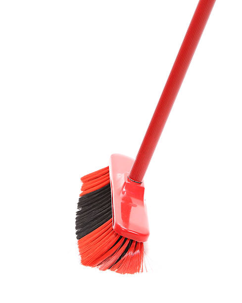 istock Close up of red black broom. 450059669