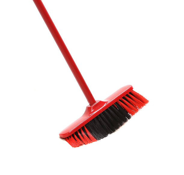 istock Close up of red black broom. 450059749