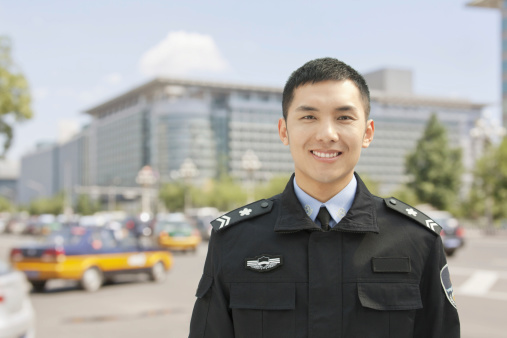 Police Officer Smiling, Portrait, China