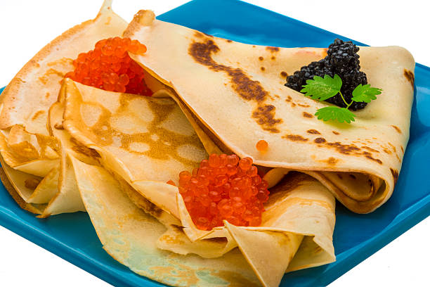 istock Pancake with red and black caviar 450072083