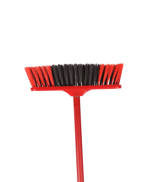 istock Close up of red black broom. 450074813