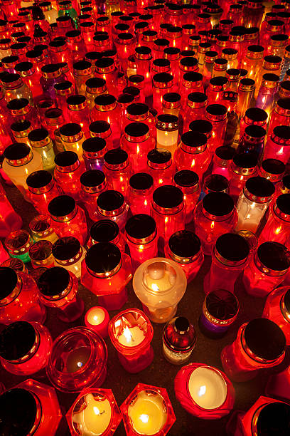 istock Thousands of candles illuminating a cemetery during  All Saint's Day 450078493