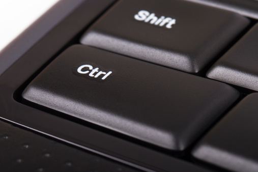 Ctrl key on black computer keyboard.