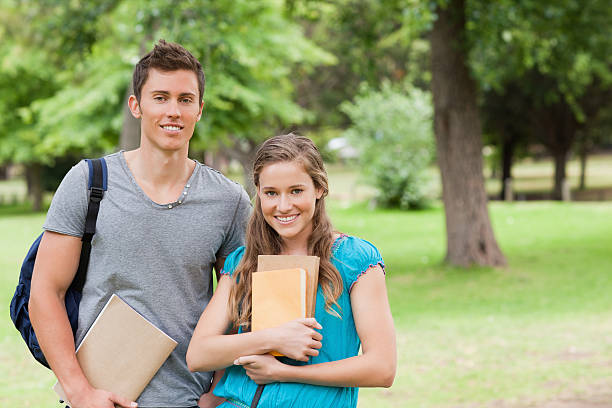 istock Portrait of a beautiful young students couple 450089063