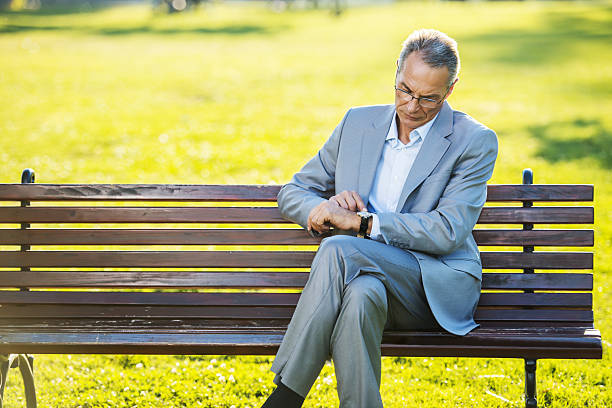 istock Businessman in the park. 450097151
