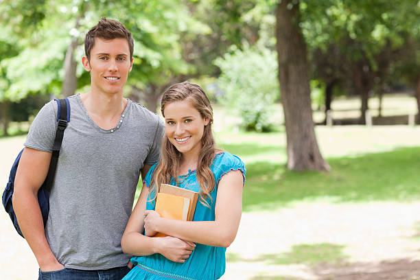 istock Beautiful young couple of student 450106657