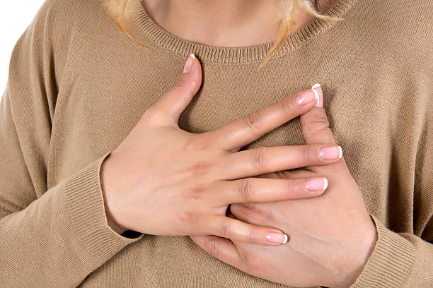 istock Woman with chest pain 450112263