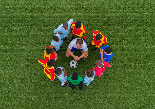 istock Football Team Meeting 450121933