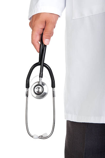 istock Male doctor holding stethoscope 450129287