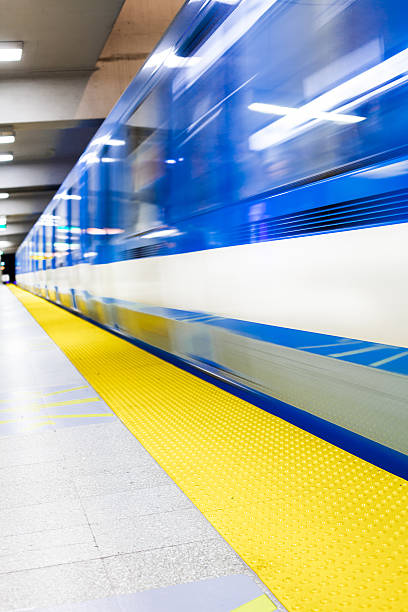 Colorful Underground Subway Train with motion blur Colorful Underground Subway Train and Platform with motion blur montreal underground city stock pictures, royalty-free photos & images