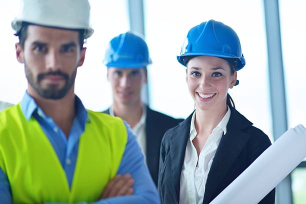 istock business people and engineers on meeting 450135229