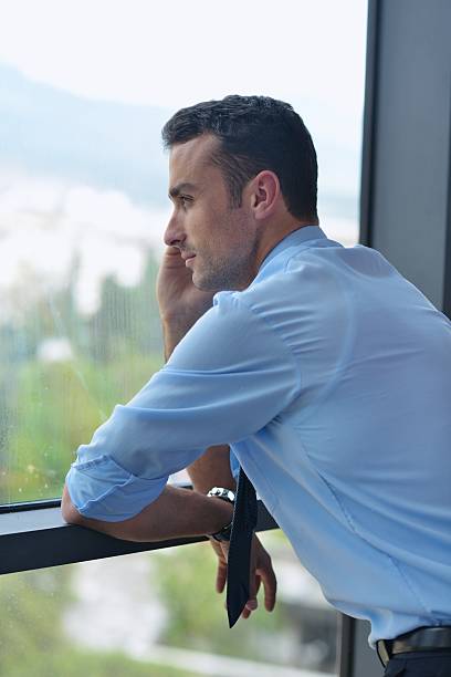 istock business man talking by cellphone 450136223