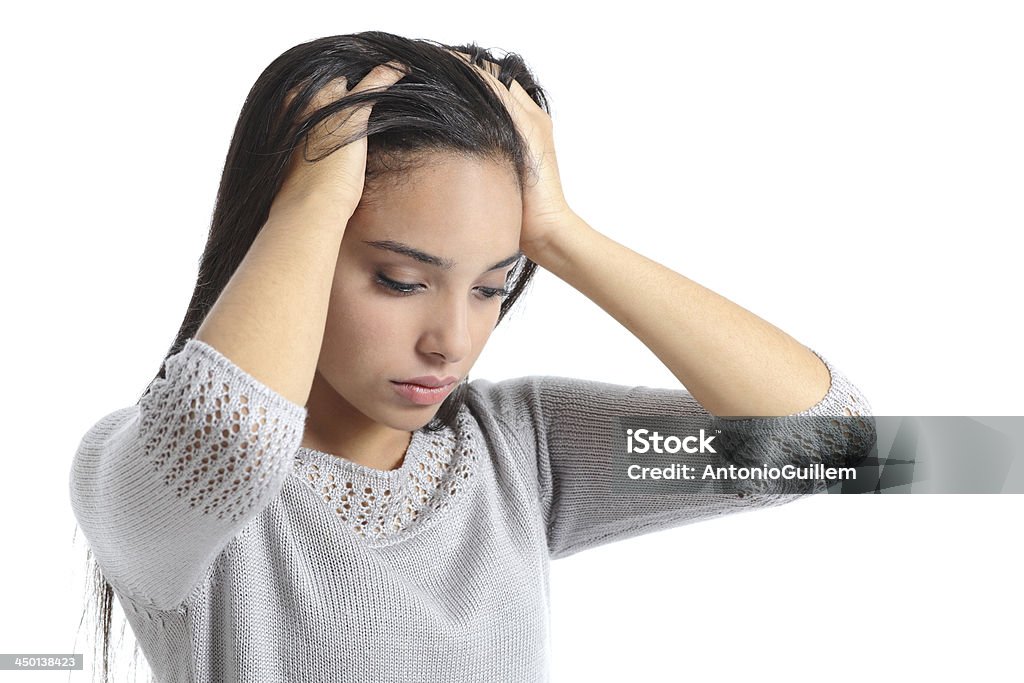Arab woman worried with hands in the head Arab woman worried with the hands in the head isolated on a white background Adult Stock Photo