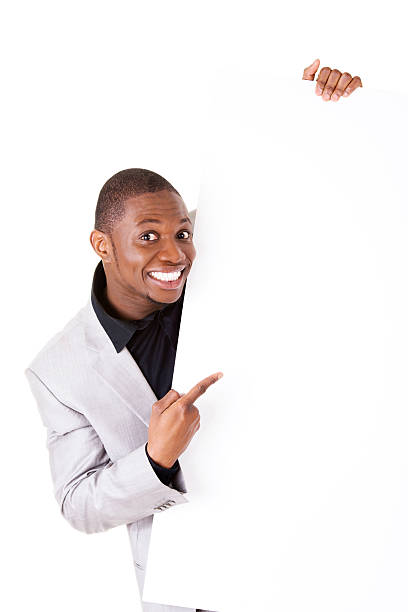 istock Young handsome businessman holding copy space. 450142519