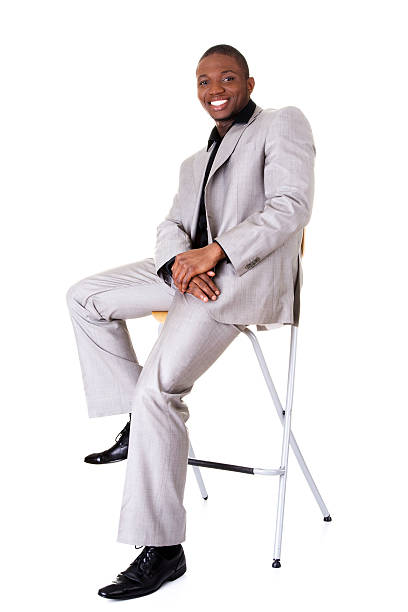 istock Young handsome businessman sitting. 450144377