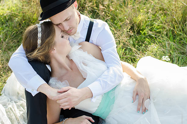 istock Bride and groom posing outdoor 450149231