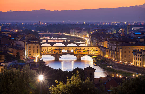 istock Ponte Vecchio night view over Arno  river in Florence 450164819