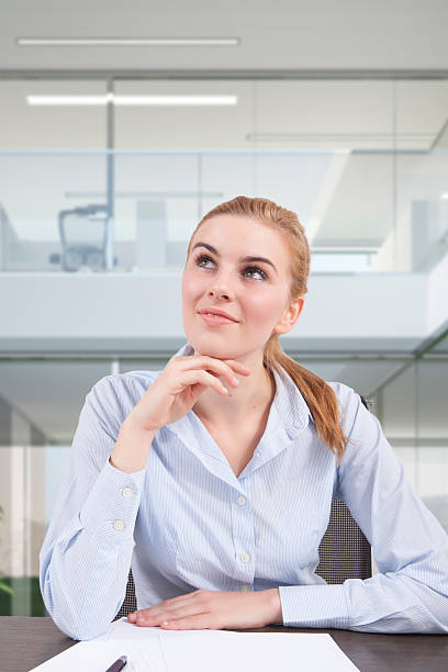 istock businesswoman at desk 450167055