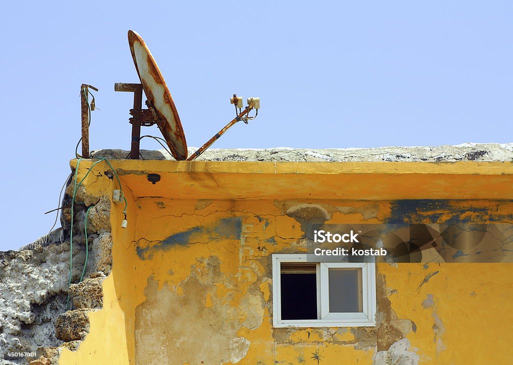 walkup apartment with rusty satellite antenna .Tel Aviv.israel Antenna - Aerial Stock Photo