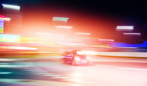 istock Speeding car at night in the city 450210835
